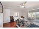 Charming bedroom boasts hardwood floors, ceiling fan, and a cozy atmosphere for relaxation at 321 108Th W St # 120, Bradenton, FL 34209