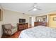 Bedroom featuring dresser, TV and a comfortable chair at 321 108Th W St # 120, Bradenton, FL 34209