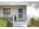 Inviting condo entrance featuring a well-maintained exterior, with lovely front porch at 321 108Th W St # 120, Bradenton, FL 34209