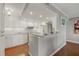 Bright, remodeled kitchen featuring white cabinets and granite countertops at 321 108Th W St # 120, Bradenton, FL 34209