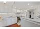 Well-lit kitchen features granite counters, ample cabinet space, and updated appliances at 321 108Th W St # 120, Bradenton, FL 34209
