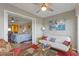 Relaxing sunroom with a cozy futon and stylish decor, perfect for lounging at 321 108Th W St # 120, Bradenton, FL 34209