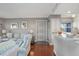 Comfortable living room with a gray sofa, chair, and hardwood floors at 321 108Th W St # 120, Bradenton, FL 34209