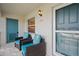 Relax on the private patio with comfortable seating, creating a welcoming outdoor space at 321 108Th W St # 120, Bradenton, FL 34209