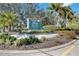 Beautifully landscaped entrance sign for Perico Island community with mature trees at 321 108Th W St # 120, Bradenton, FL 34209
