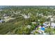 Overhead view of a tree-lined property, showcasing a quiet and secluded neighborhood near the water at 325 12Th W Ave, Palmetto, FL 34221