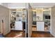 Open closet featuring custom shelving, drawers and hanging racks for storage at 325 12Th W Ave, Palmetto, FL 34221