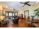 Comfortable living room featuring hardwood floors, natural light, and comfortable seating at 325 12Th W Ave, Palmetto, FL 34221