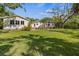 Large, manicured lawn and sprawling backyard at 325 12Th W Ave, Palmetto, FL 34221