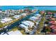 An aerial view of a waterfront community with beautiful canals and multi-story residences at 4104 128Th W St # 704, Cortez, FL 34215