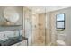 Modern bathroom featuring glass walk-in shower and stylish vessel sink at 4104 128Th W St # 704, Cortez, FL 34215