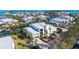 Waterfront condo building with boat access and luxurious tropical landscaping near the canal at 4104 128Th W St # 704, Cortez, FL 34215