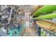 Well-organized garage equipped for bike and watersport storage at 4104 128Th W St # 704, Cortez, FL 34215