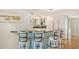 Kitchen bar area with seating for four at 4104 128Th W St # 704, Cortez, FL 34215
