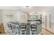 Kitchen bar area with seating for four at 4104 128Th W St # 704, Cortez, FL 34215