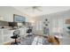 Well-lit office with standing desks, shutters, and a patterned rug at 4104 128Th W St # 704, Cortez, FL 34215