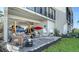 Outdoor patio area with a swing and seating at 4104 128Th W St # 704, Cortez, FL 34215