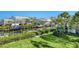 Scenic waterfront condos boast private boat docks and lush greenery, creating a tranquil and picturesque neighborhood at 4104 128Th W St # 704, Cortez, FL 34215