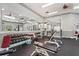 Well-equipped gym featuring mirrors, free weights, and a variety of exercise equipment at 4110 Central Sarasota Pkwy # 123, Sarasota, FL 34238