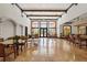 Spacious lobby featuring travertine floors, multiple seating areas, and ample lighting at 4110 Central Sarasota Pkwy # 123, Sarasota, FL 34238