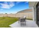 Lush backyard with patio and a privacy fence at 4231 Autumn Fog Ct, Palmetto, FL 34221
