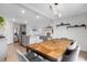 Dining room with a view into the living room and kitchen, ideal for open concept living at 4231 Autumn Fog Ct, Palmetto, FL 34221