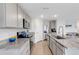 Bright kitchen features granite countertops, stainless steel appliances, and ample cabinet space at 4231 Autumn Fog Ct, Palmetto, FL 34221