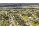 An aerial view highlights the home's location within a well-established residential neighborhood at 4493 Mckibben Dr, North Port, FL 34287
