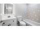 Bathroom features a vanity and stylish wall tiling at 4493 Mckibben Dr, North Port, FL 34287