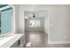 View of dining area featuring bar and open floor plan at 4493 Mckibben Dr, North Port, FL 34287