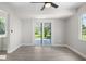 Bright living room with sliding doors and view of backyard at 4493 Mckibben Dr, North Port, FL 34287