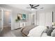 Well-lit main bedroom boasts decorative wall art and an ensuite bathroom at 4493 Mckibben Dr, North Port, FL 34287