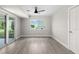 Bright room with sliding glass door and a view of backyard, offering a versatile space to relax at 4493 Mckibben Dr, North Port, FL 34287
