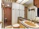 Full bathroom with tiled shower, vanity and countertop with plenty of natural light at 4701 Pine Harrier Dr, Sarasota, FL 34231