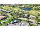 Panoramic aerial view with a neighborhood that features pond and golf course access at 4965 Marsh Field Rd, Sarasota, FL 34235