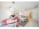 Open-concept living area with dining table and comfortable seating at 4965 Marsh Field Rd, Sarasota, FL 34235
