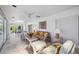 Cozy sunroom with comfortable furniture and decor providing a relaxing atmosphere at 4965 Marsh Field Rd, Sarasota, FL 34235