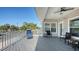 Spacious balcony with outdoor seating, offering a relaxing space with views of the surrounding neighborhood at 5007 2Nd Ave, Holmes Beach, FL 34217