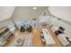 Spacious living room with high ceilings, modern furniture, and open concept to dining and kitchen at 5007 2Nd Ave, Holmes Beach, FL 34217