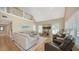 Bright, open living room featuring high ceilings, natural light, and modern, comfortable furnishings at 5007 2Nd Ave, Holmes Beach, FL 34217