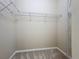 Spacious walk-in closet with carpet and wire shelving for optimal storage and organization at 5011 Kincaid Park Ln, Bradenton, FL 34211