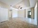 Spacious living room boasting tile floors and tray ceiling, ideal for entertaining guests or relaxing at 5011 Kincaid Park Ln, Bradenton, FL 34211