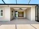 Covered patio with space for outdoor entertaining and featuring a ceiling fan at 5011 Kincaid Park Ln, Bradenton, FL 34211
