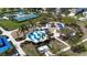 Aerial view showcasing the splash park, playground, and tennis courts near the pavilions at 5011 Kincaid Park Ln, Bradenton, FL 34211