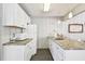 The kitchenette offers ample counter space, essential appliances and storage, and is conveniently located within the recreation room at 5117 27Th W St # 5117, Bradenton, FL 34207