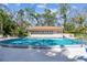 Refreshing community pool, perfect for relaxation with clear blue water, surrounded by lush greenery and ample lounging space at 5117 27Th W St # 5117, Bradenton, FL 34207