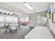Recreation room features tables, seating, and storage, providing residents with a comfortable place to gather and socialize at 5117 27Th W St # 5117, Bradenton, FL 34207