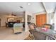 Bright sun room with comfortable seating, tile floors, and view through to the living room at 5117 27Th W St # 5117, Bradenton, FL 34207