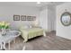 Bright bedroom with a seating area and a view, providing a tranquil space for rest and rejuvenation at 5240 Hyland Hills Ave # 1426, Sarasota, FL 34241