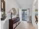 Inviting foyer with decorative accents and tile flooring at 5240 Hyland Hills Ave # 1426, Sarasota, FL 34241